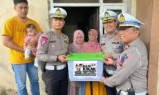 Satlantas Polresta Bogor Kota Peduli Keluarga Korban Laka dengan Bagi Kolak
