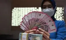 Rupiah Melemah ke Rp18.099 per Dolar AS pada Rabu Pagi, Turun 16 Poin