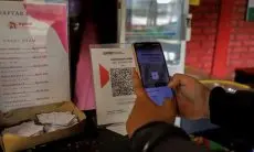 FOTO: Tarif QRIS Naik