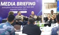FOTO: Kebijakan Penyesuaian Tarif MDR QRIS