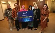 AXA Mandiri Serahkan Manfaat Perlindungan Jiwa Senilai Miliaran Rupiah kepada Nasabah