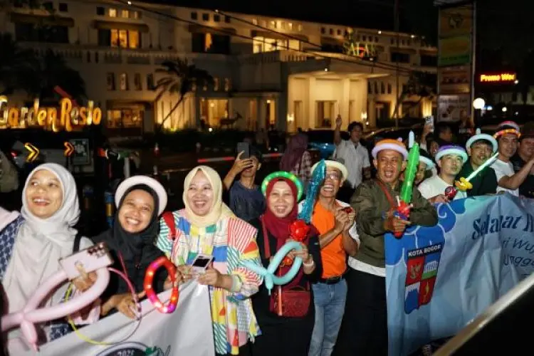 Warga Semangat Saksikan Helaran HJB ke-543 Meski Diguyur Hujan, Wali Kota Sebut Ini Berkah
