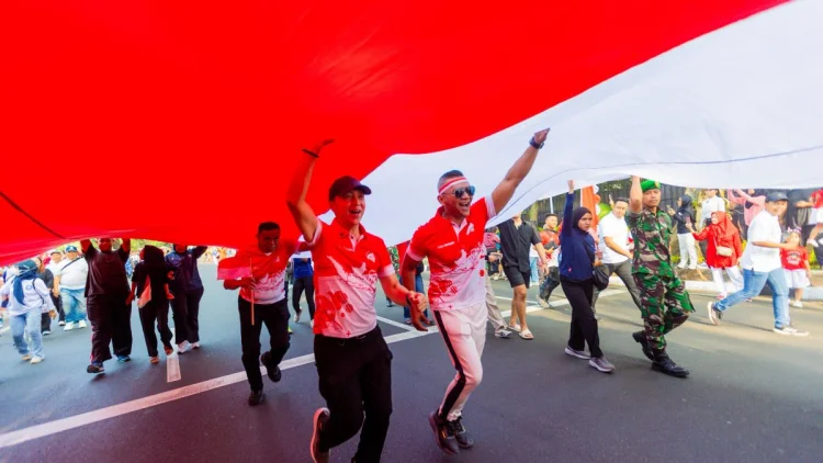 FMP ke-11 Dimeriahkan dengan Kirab Bendera Sepanjang 500 Meter