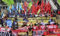 Aturan Dinanti Upah Belum Pasti