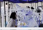 Tokyo Minta China Hentikan Tes Anal Covid-19 terhadap Warga Jepang