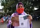 Foto: Pencairan Bansos PPKM Darurat