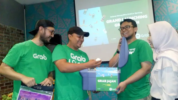 Grab-Nestle Berikan Benefit Lebih Driver Mitra