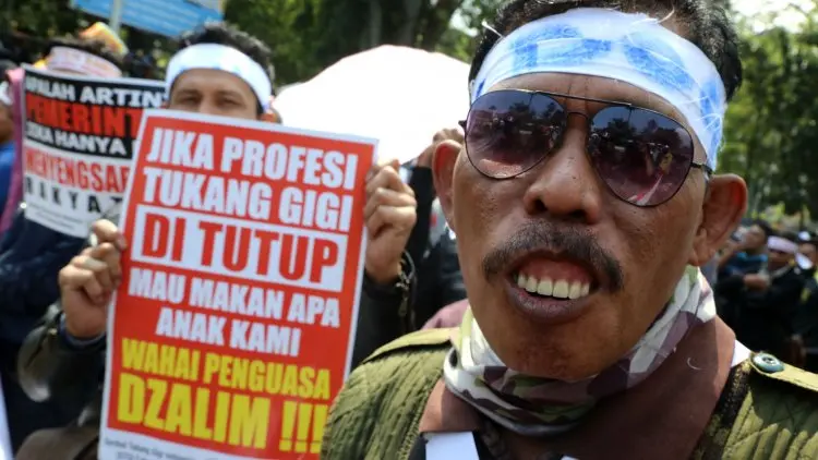 Foto: Tukang Gigi Tolak RUU KUHP