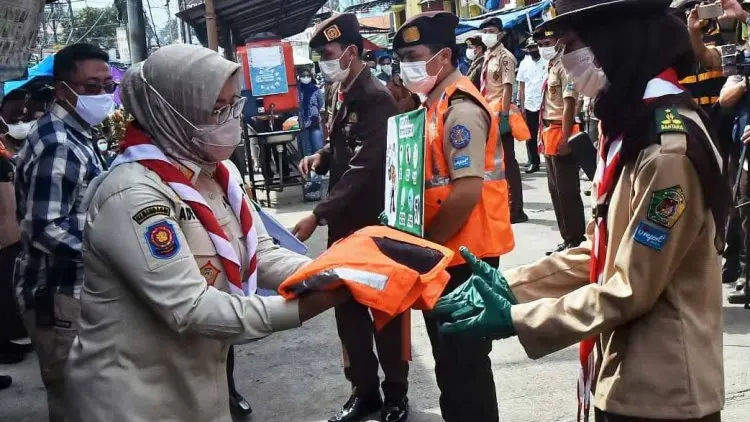 Pramuka Peduli Sosialisasi Aturan PPKM dan Prokes Covid-19