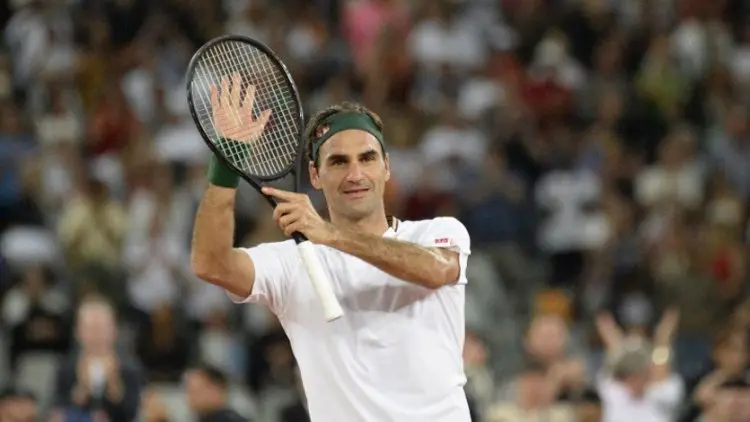 Inilah Ritual Federer Usai Kalahkan Evans