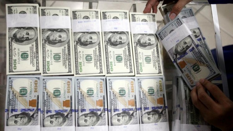 Yuan China Melemah Jadi 6,8988 Terhadap Dolar AS Pada Senin